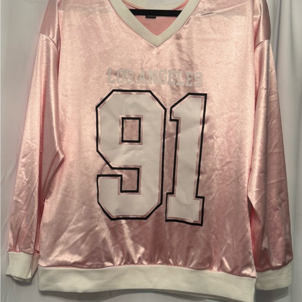 pink and white numbered jersey